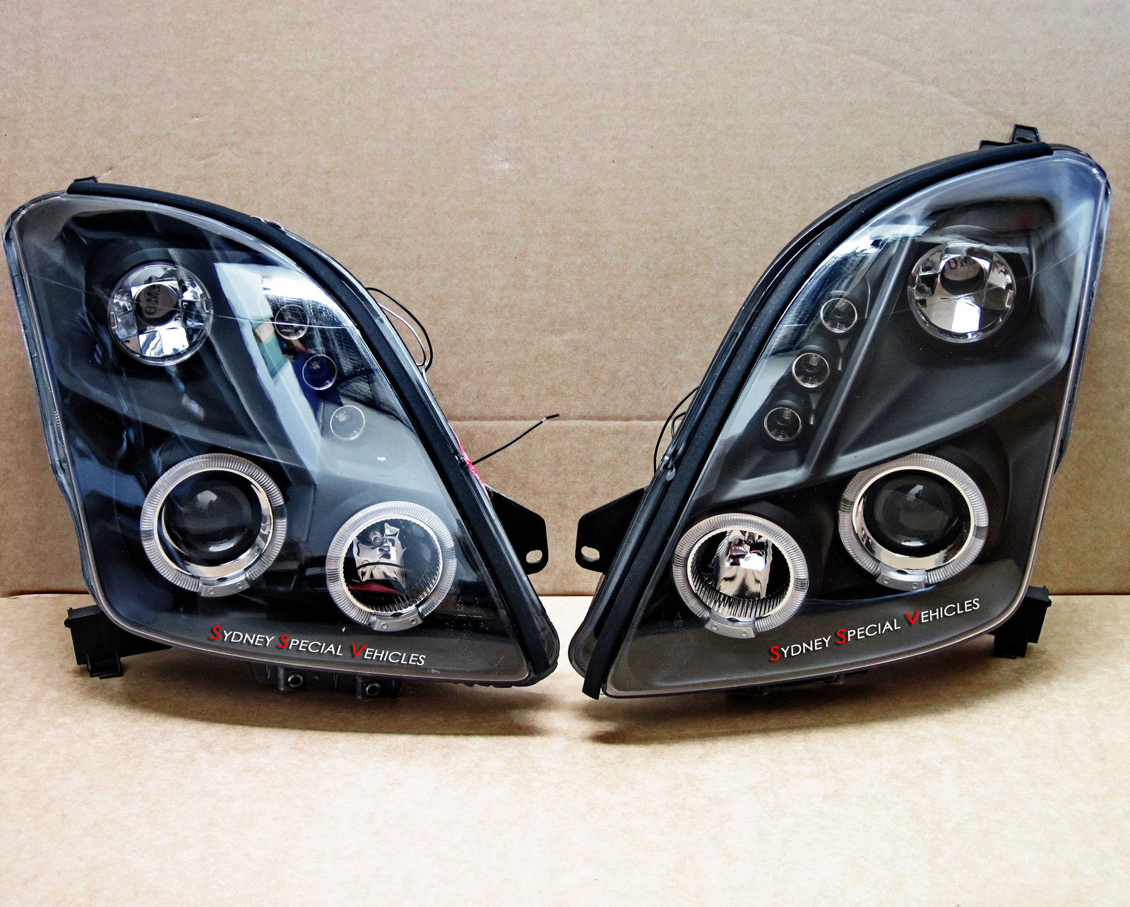 HEADLIGHTS FOR SWIFT 2005 2010 BLACK PROJECTOR STYLE WITH ANGEL EYES