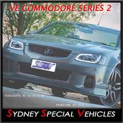  HEADLIGHTS FOR VE COMMODORE SERIES 2 - BLACK DRL WITH CONTINUOUS LED STRIP